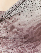Detail view of Tally Weijl multi animal print top with mesh fabric and black embellishments
