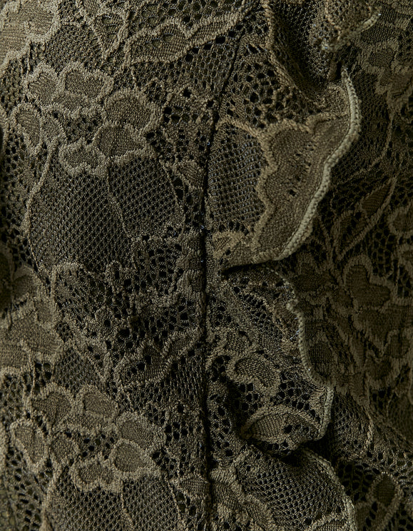 Detail view of the green lace fabric and ruffle trim on the Tally Weijl khaki lace top