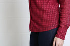 Rant & Rave Vivian Shirt in burgundy, fabric detail view showing the intricate lace pattern and hem