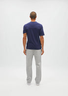 Diesel Walter Tee in navy worn by a model, back view showing the plain rear panel and short sleeves.
