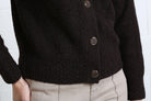 Rant & Rave Claire Cardigan in dark brown, close - up detail view of buttons and ribbed hem