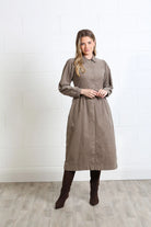 Rant & Rave Hazel Shirt Dress Biscuit in biscuit corduroy, front view worn by model with brown knee - high boots.