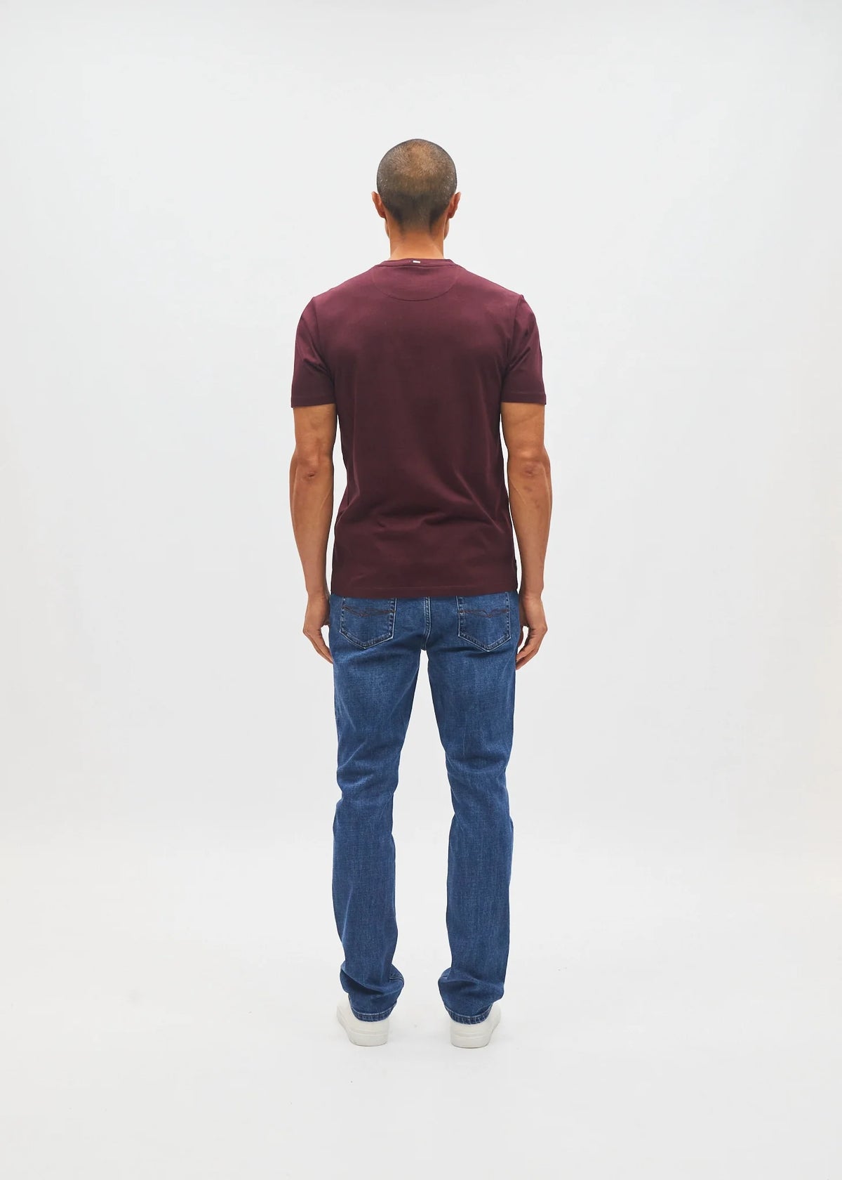 Diesel John Tee in deep burgundy worn by a model, back view