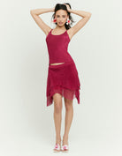 Tally Weijl pink knit tank top worn by model in full - length front view