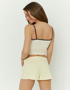 Tally Weijl yellow printed tank top worn by model, back view