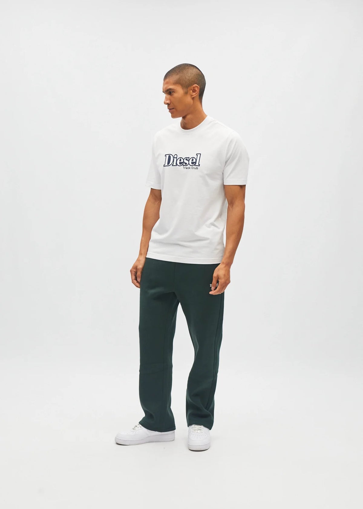 Diesel Walter Tee Wimbedon white t-shirt worn by a model in an angled view