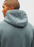 Diesel Jameson Hoodie in Green Meadow, back detail view of the hood and metal logo bar.