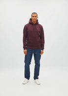 Diesel Julian hoodie in deep burgundy, front view worn by model with hands at sides