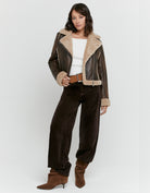 Tally Weijl brown aviator jacket with beige shearling trim, full - length model view