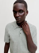 JACK & JONES Riley Knit Short Sleeve Polo in Laurel Wreath twist angled model view