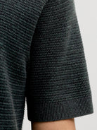 JACK & JONES Riley Knit Short Sleeve Polo in Scarab twist textured knit sleeve detail