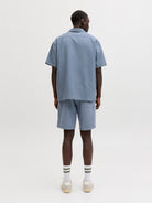 Back model view of Blue Mirage waffle resort shirt