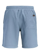 Jack & Jones Jaiden waffle resort shorts in blue mirage back flat view