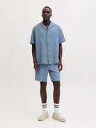 Jack & Jones Jaiden waffle resort shorts in blue mirage full length model view