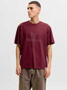 JACK & JONES Frederiksberg Monogram Crew Neck Tee in Chocolate truffle angled model view