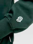 JACK & JONES Frederiksberg Monogram Sweat Hoodie in Pine Grove logo detail