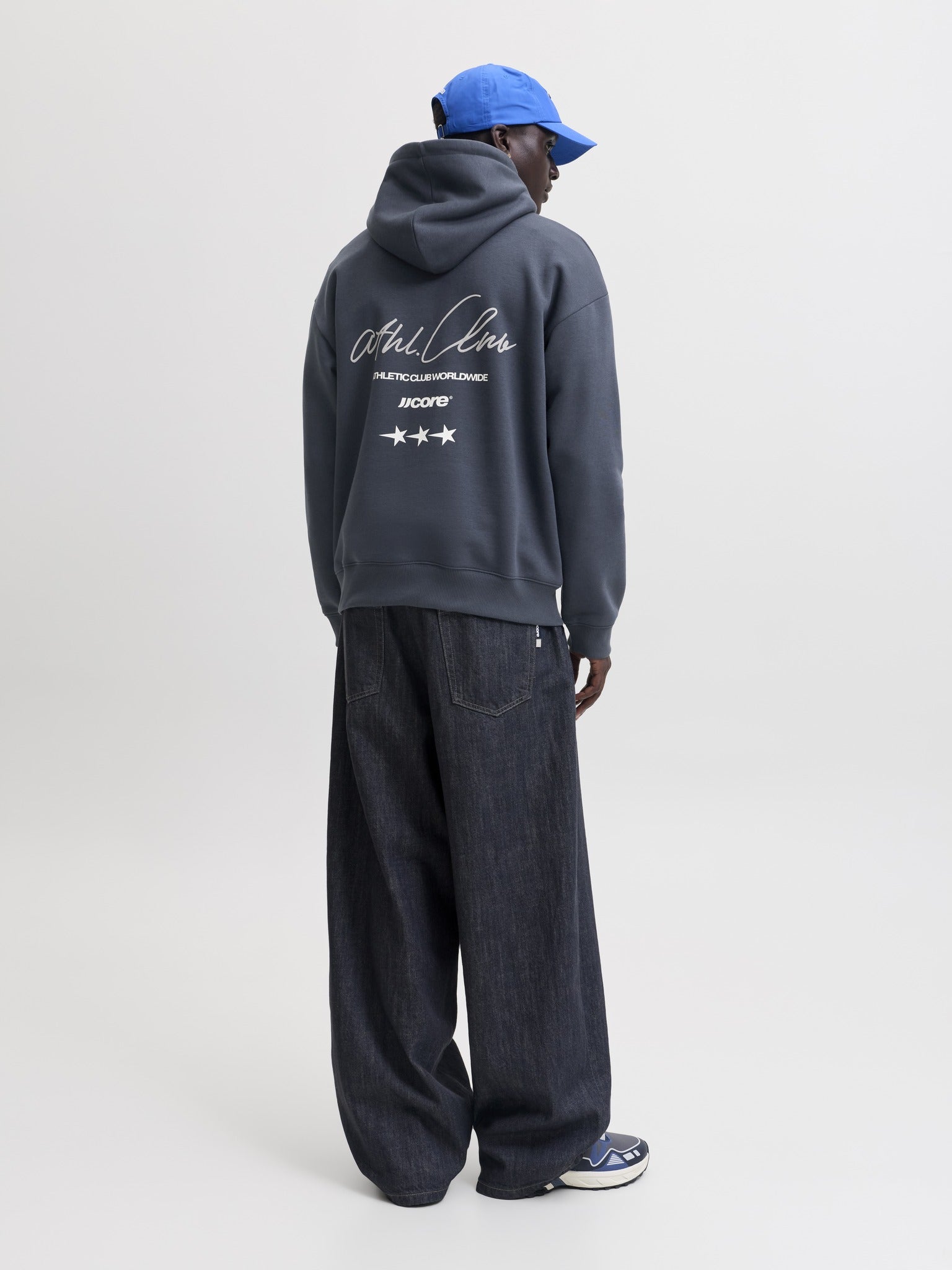 JACK & JONES Club Back Script Print Sweat Hoodie in Outer Space angled model view