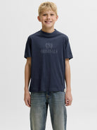 Jack Jones Youths Frederiksberg Monogram Crew Neck Tee Junior in Sky Captain full length model view