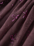 NAME IT Vabos Skirt in Catawba Grape Dots glitter bow fabric detail