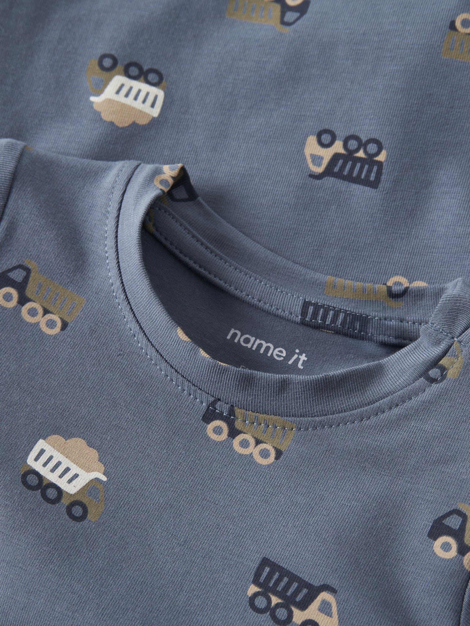 NAME IT Vroels Long Sleeve Bodysuit in Blue Mirage Trucks collar and print detail