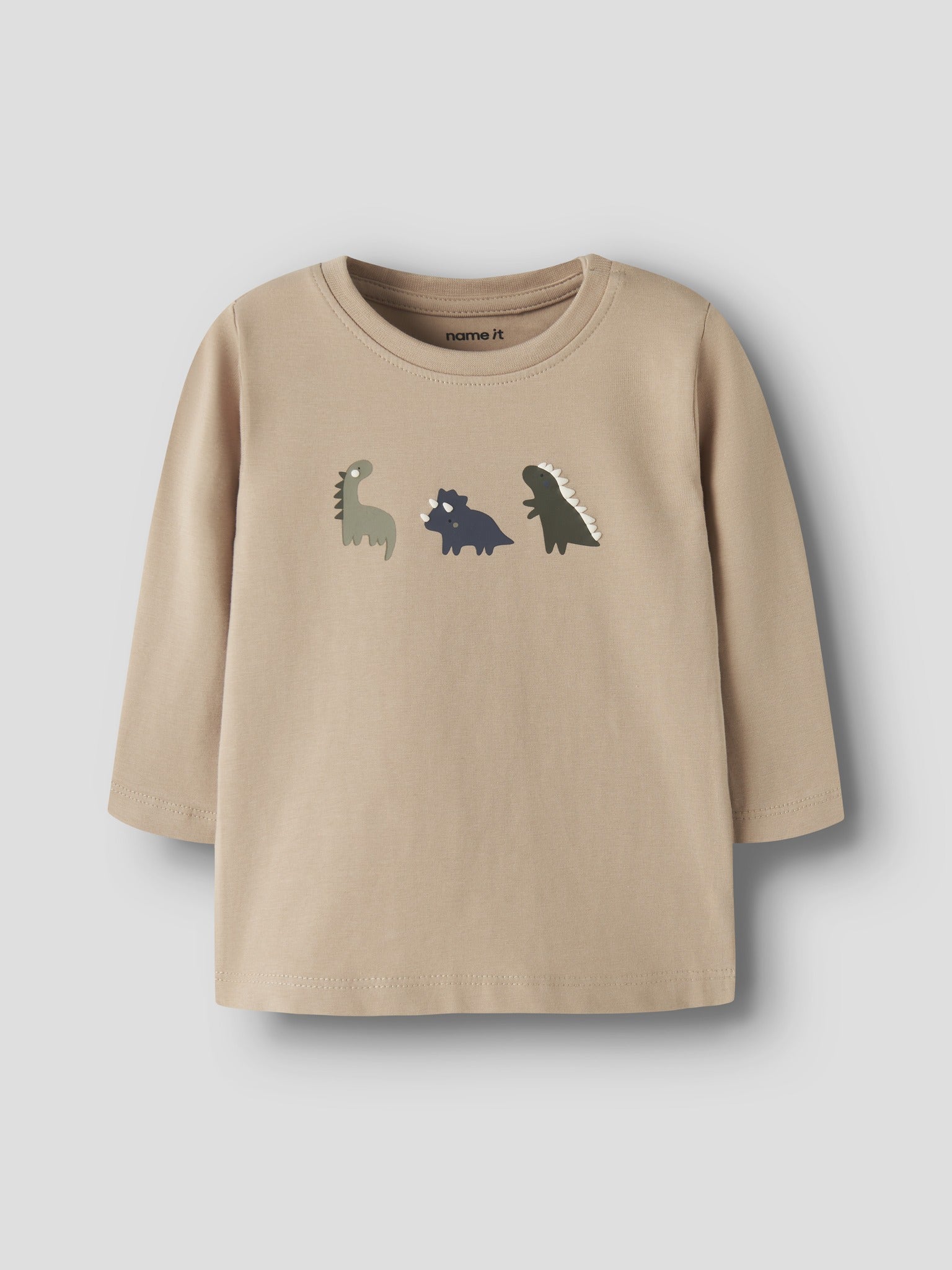NAME IT Vacion Long Sleeve Top in Sesame Dinos angled view