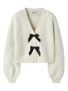 NAME IT Rina Long Sleeve Knit Cardigan in Antique White Black Bow front view