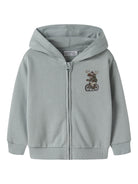 Front view of NAME IT Voltinus zip-up hoodie in Abyss Moose Bike with a moose riding a bicycle print