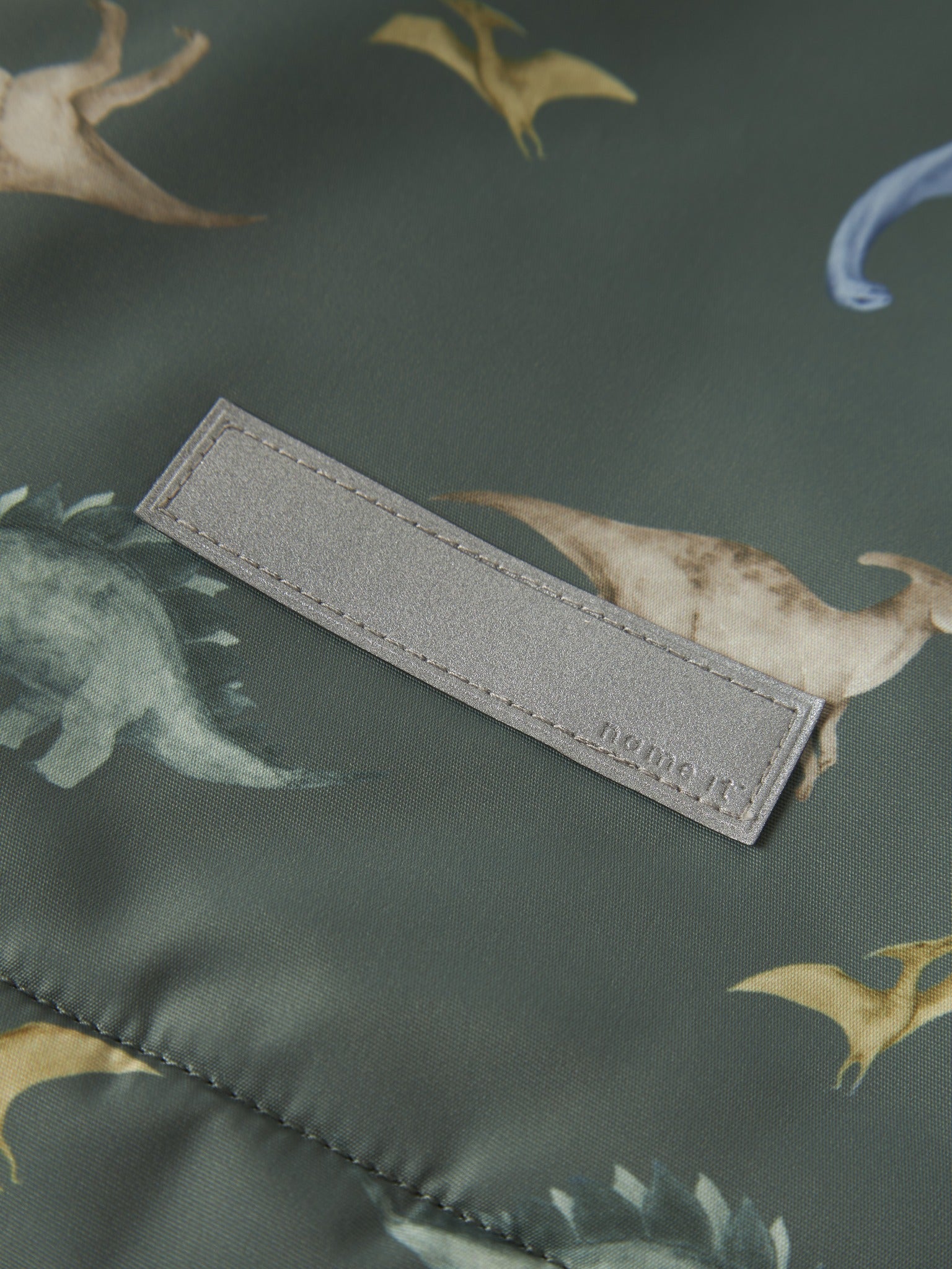 NAME IT Max Padded All Over Print Jacket in Laurel Wreath reflective logo patch detail