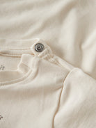 NAME IT Laurids Long Sleeve Top in Antique White snap button detail