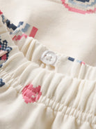 NAME IT Lilith Sweat Skirt in Antique White button waist detail