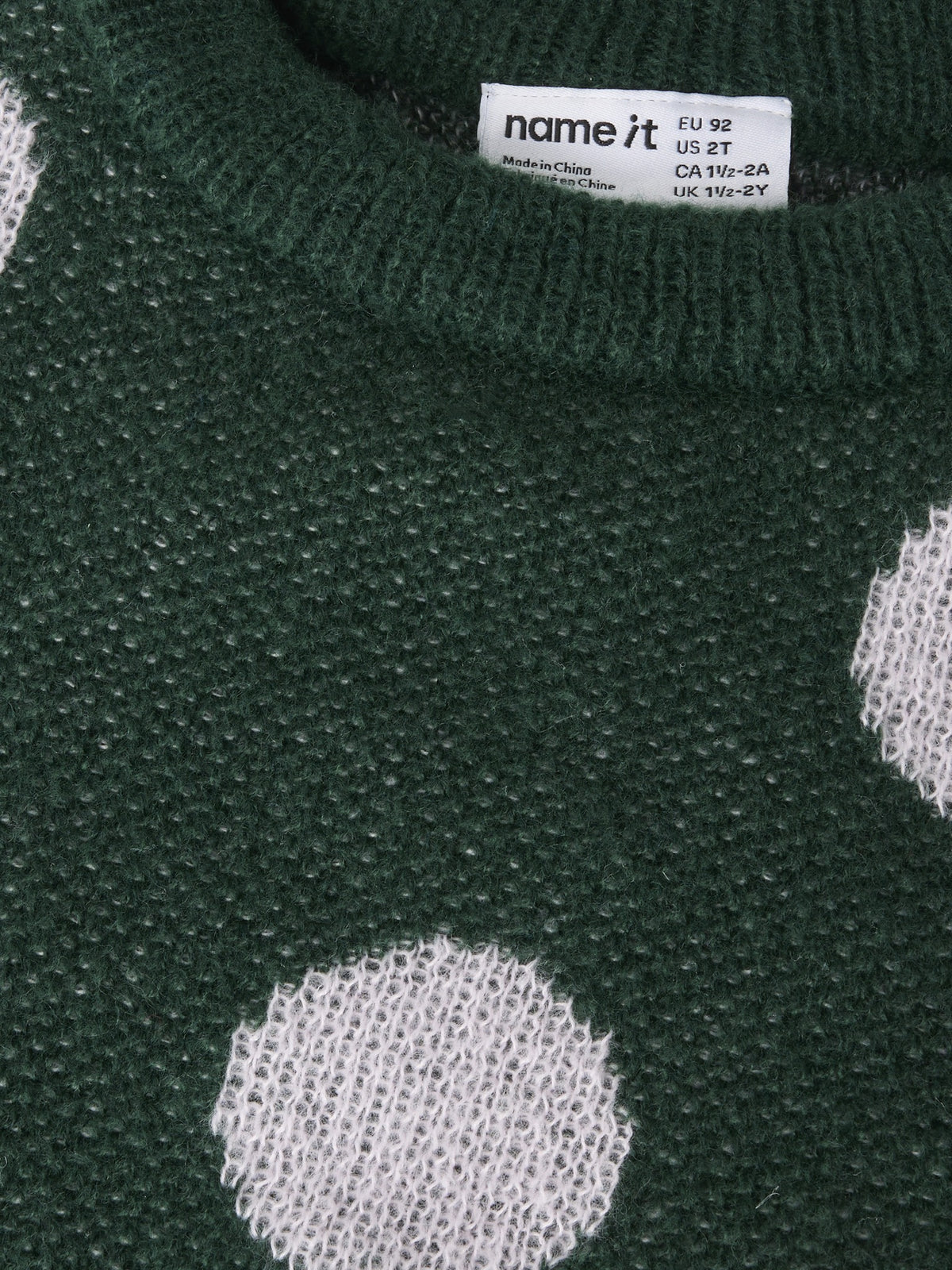 NAME IT Olisa Long Sleeve Knit BF in Pine Grove polka dot knit and label