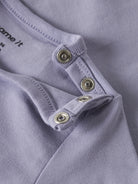 NAME IT Nivas Long Sleeve Top in Heirloom Lilac snap button placket detail