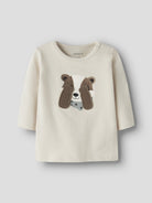 NAME IT Racer Baby Boys’ Long Sleeve Animal Print Top in Birch, front view on a grey background