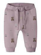 NAME IT Ragine Baby Girls’ Printed Sweatpants in Mauve Shadows, front view showing the waist tie and teddy bear print