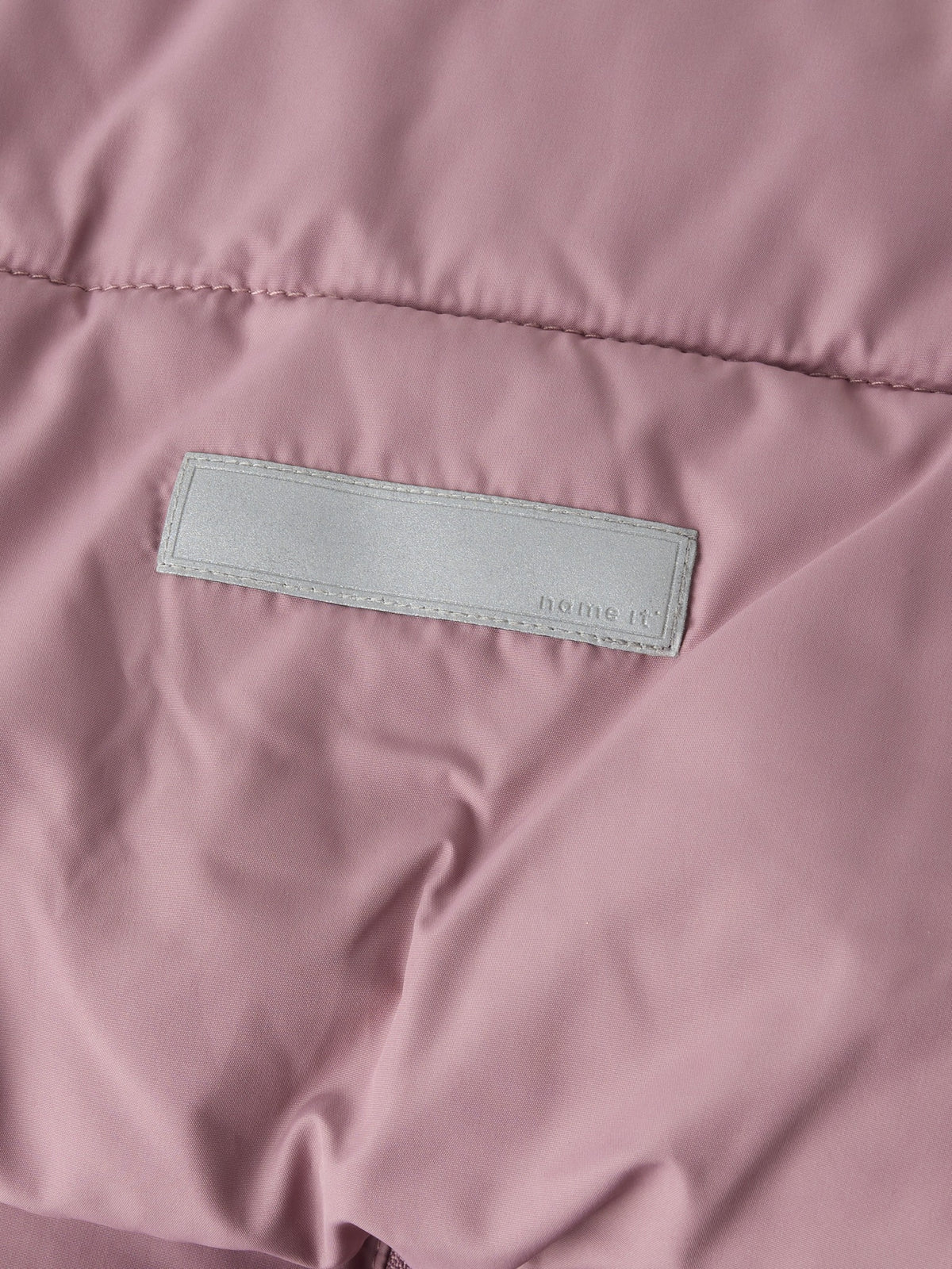 NAME IT Forty Puffer Jacket in Wistful Mauve reflective logo patch detail