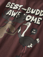 Close-up of the animal graphics and lettering on the NAME IT Rafo top in Andorra
