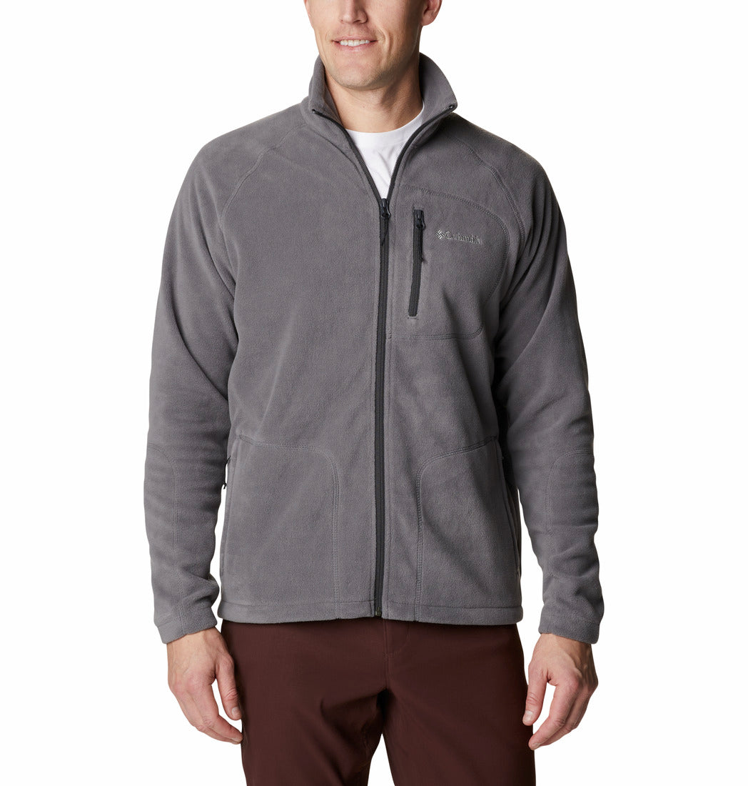 Man wearing a gray fleece jacket on a white background
