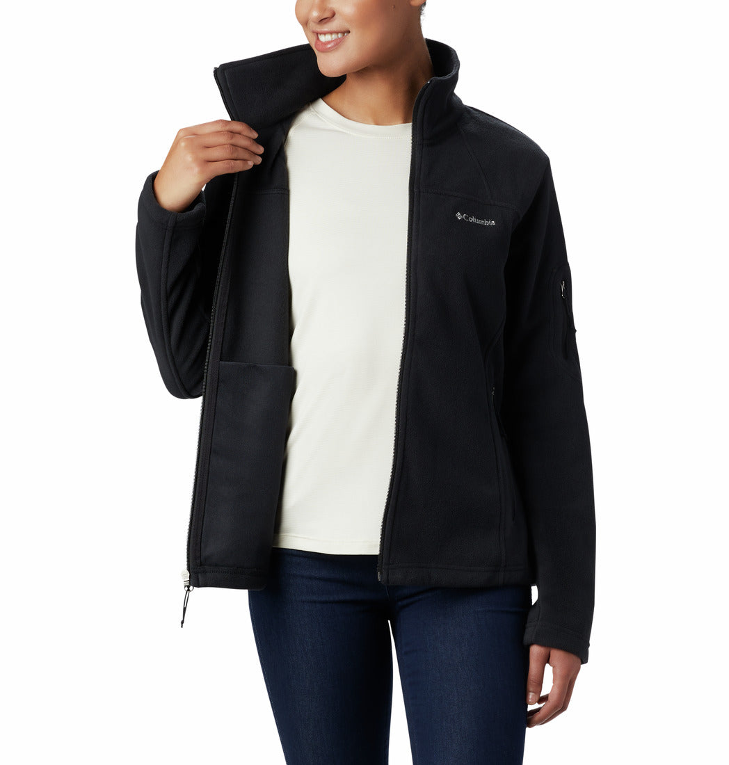 Person wearing a black jacket with Columbia logo on a white background