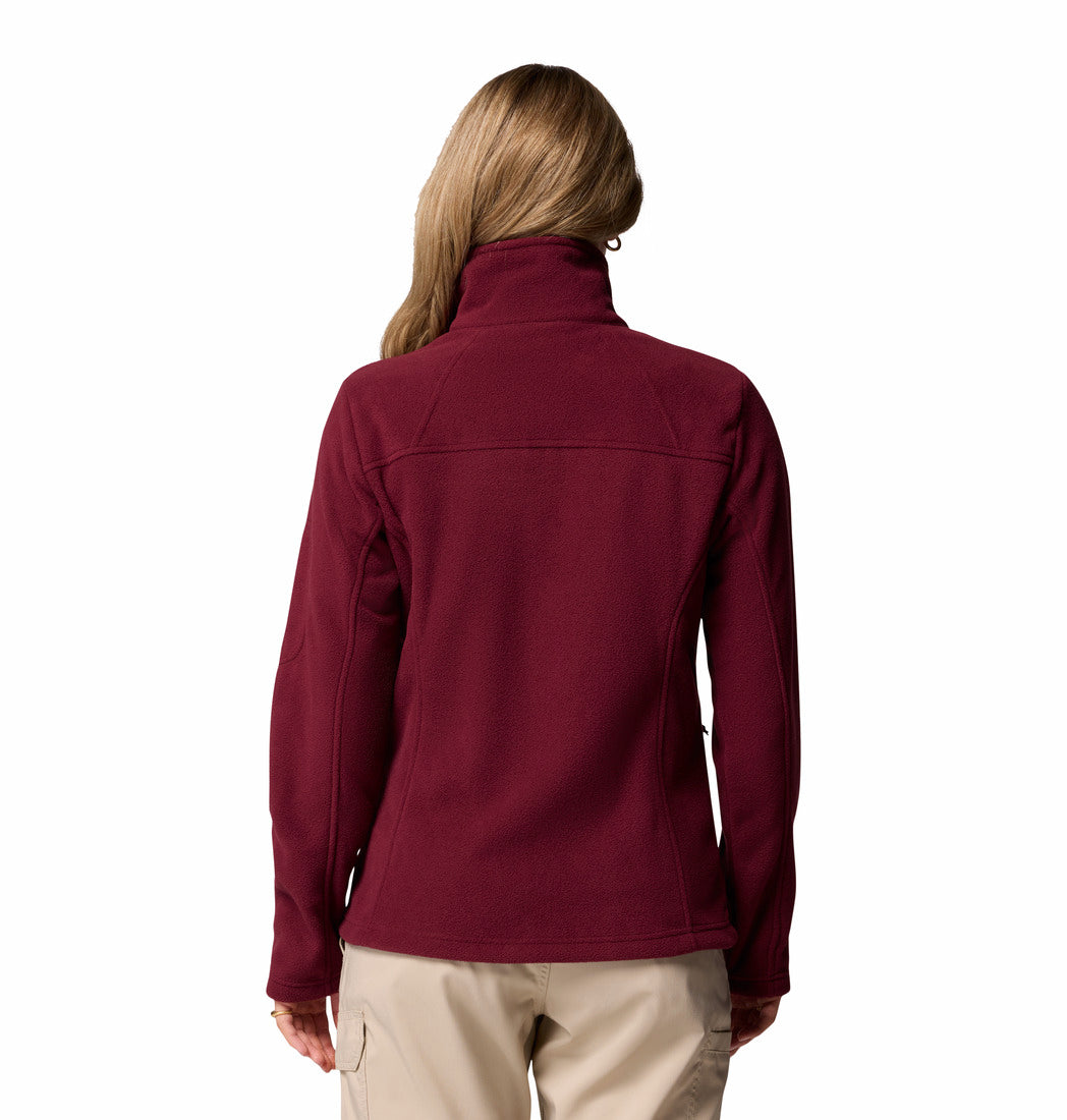 Person wearing a maroon fleece jacket on a white background