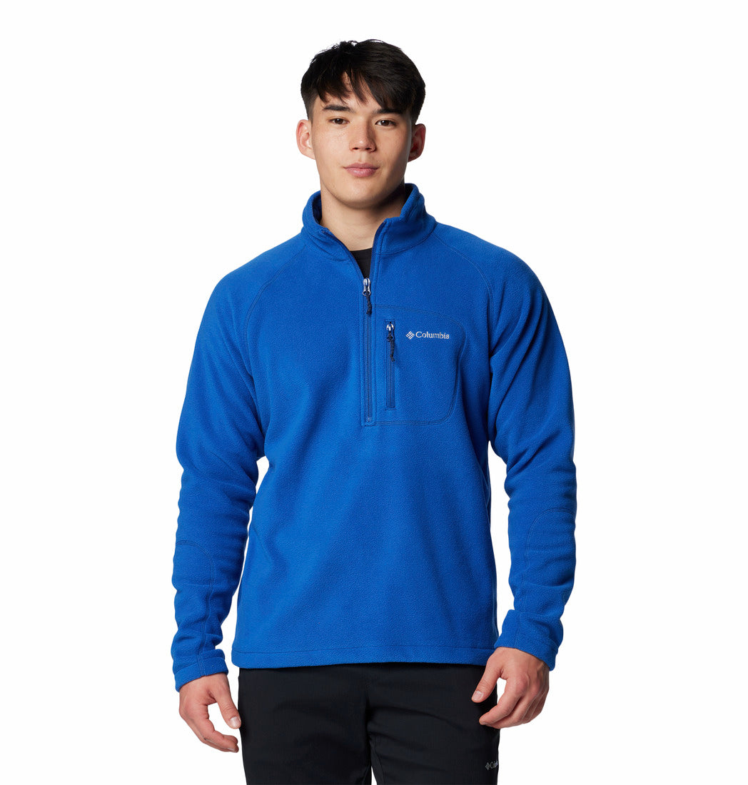 Person wearing a blue fleece pullover with Columbia logo on a white background