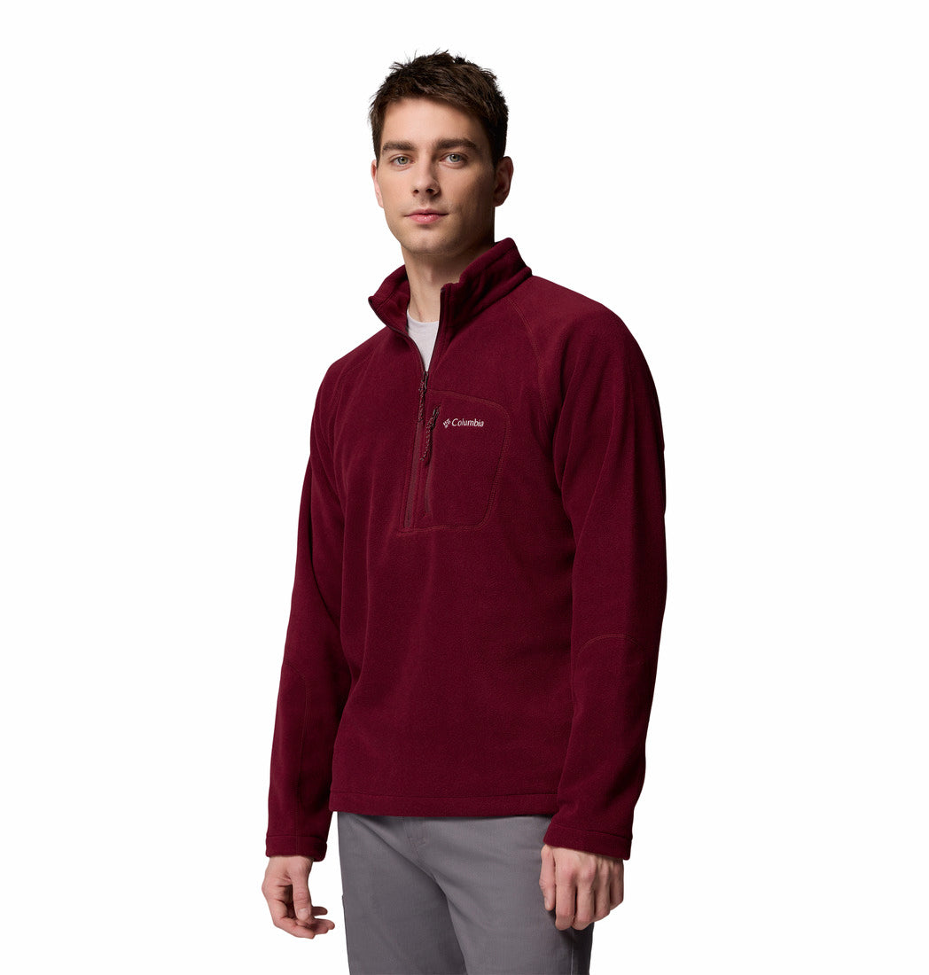 Man wearing a maroon Columbia fleece pullover on a white background