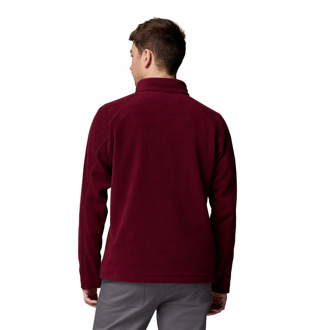 Man wearing a burgundy fleece jacket on a white background