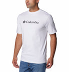Man wearing a white Columbia t-shirt on a white background