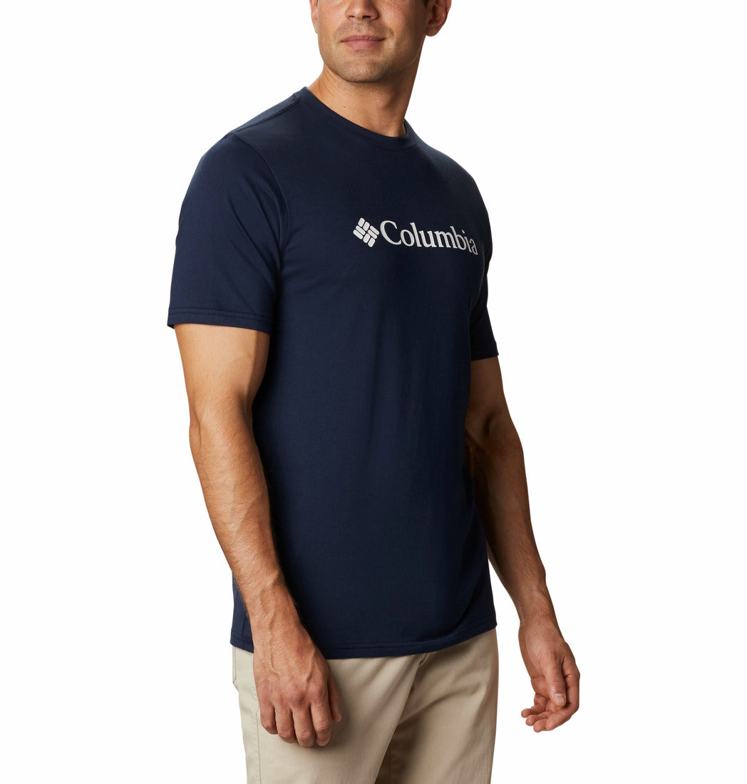 Man wearing a navy Columbia t-shirt on a white background