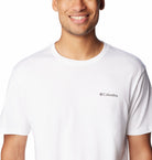 Man wearing a white Columbia t-shirt on a white background