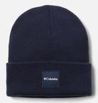 Navy blue beanie with Columbia logo on a light gray background