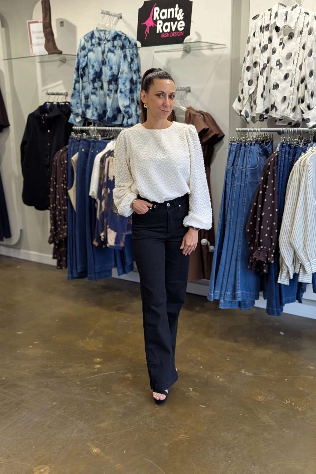 Olivia in the Jane Wide Leg Black Jean paired with Hannah Cream Top