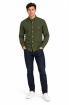 Full-length front view of the Tom Penn Moss Oxford long-sleeve shirt