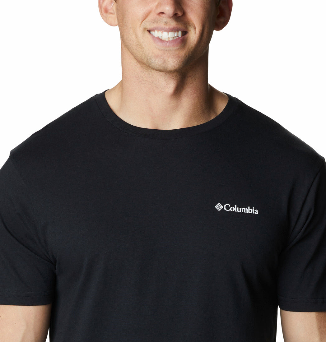 Man wearing a black Columbia t-shirt on a white background
