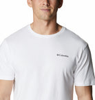 Man wearing a white Columbia t-shirt on a white background